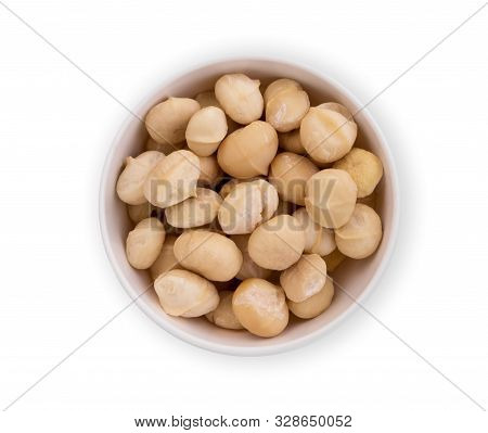 Shelled Macadamia Fruit In The White Bowl Isolated On White Background, Flat Lay, Top View