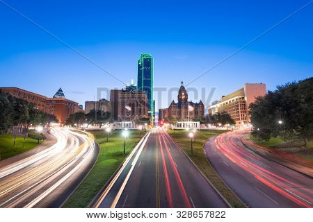 Dallas, Texas, USA skyline over Dealey Plaza at twilight.