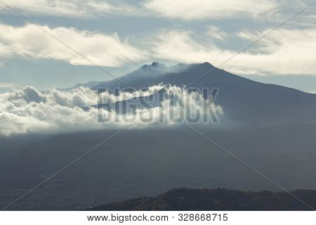View Of The Etna Volcano In The Clouds From Castelmola Sicily