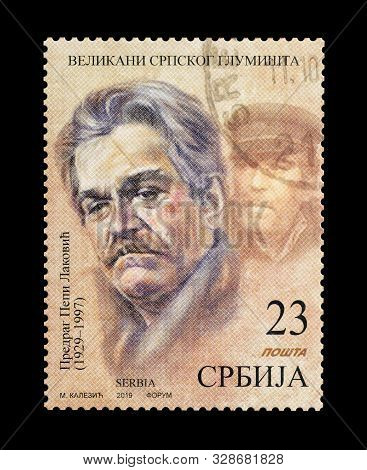 Cancelled Postage Stamp Printed By Serbia, That Shows Portrait Of Actor Predrag Pepi Lakovic, Circa 