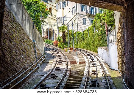 View To Citta Alta Houses From Tunnel Of Funicular, Bergamo, Italy. Funicular San Vigilio Connects O
