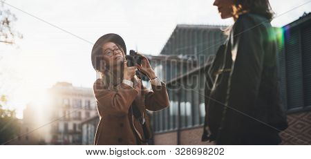 Hobby Photographer Concept Mokup. Outdoor Lifestyle Portrait Of Pretty Woman Having Fun In Sun City 
