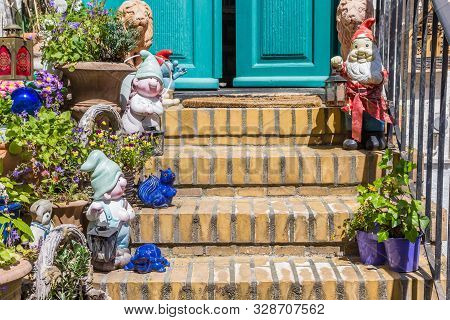 Garden Gnomes At The Steps Of A House In Flensburg, Germany