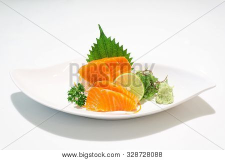 Premium Salmon Sashimi Slice On A White Plate,japanese Food