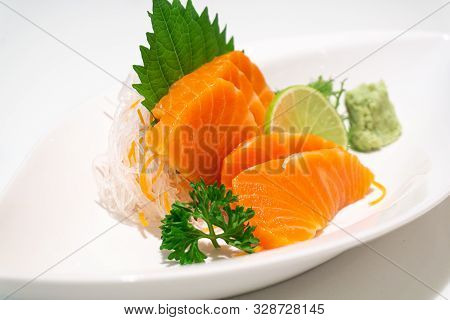 Premium Salmon Sashimi Slice On A White Plate,japanese Food