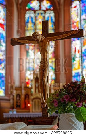 Hunawihr, France, October 13, 2019 : Crucifix And Stained Glasses Of Hunawihr Church, In Alsace