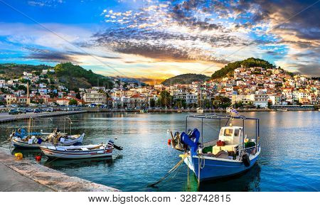 Greece landmarks - beautiful island Lesvos (Lesbos). Scenic Plomarion (Plomari) town over sunset