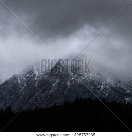 Stunning Detail Landscape Images Of Snowcapped Pen Yr Ole Wen Mountain In Snowdonia During Dramatic 