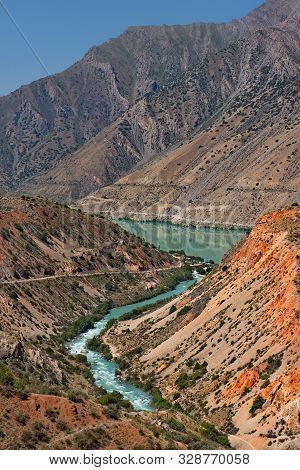 Tajikistan. The Pamir Highway. Panorama Of The Mountain River Iskanderdarya Flowing From Lake Iskand