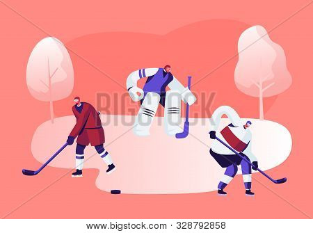 Hockey Game Competition On Ice Rink. Attacking Player Hitting Puck, Goalkeeper Catching It Protectin