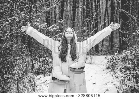 People In Snow. Beauty Winter Girl In Frosty Winter Park. Outdoor Close Up Portrait Of Young Beautif