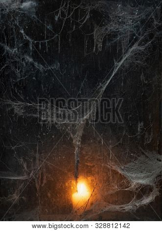 Scary spider web in the dark. Background for Halloween party