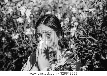 The Girl Suffers From Pollen Allergy During Flowering And Uses Napkins. Beautiful Sexy Young Woman L