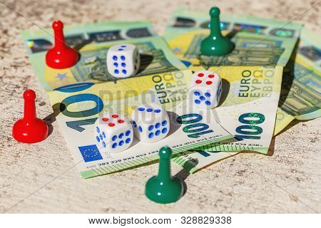 Multi-colored Plastic Chips, Dice Of Board Games With Hundredth Euro Banknotes. Gambling Concept