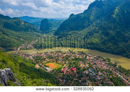 Aerial View Of Village Of Nong Khiaw. North Laos. Southeast Asia. Photo Made By Drone From Above. Bi