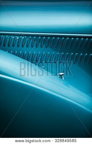 Color Close Up Of The Air Vents Of A Blue Vintage Classic Car.