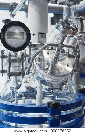 The Upper Part Of The Chemical Reactor. The Glass Reactor Lid Is Equipped With Piping. Sophisticated