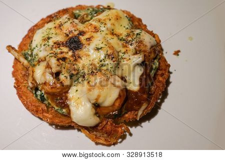 Potato Rosti Seafood Fish Cake With Mozarella, Dill And Salted Herring In Plate