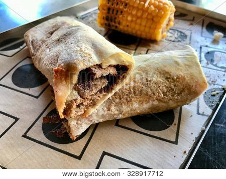 Shawarma Kebab With Beef Tenderloin Slices, Muhammara And Corn At Fast Food Restaurant With Tray.