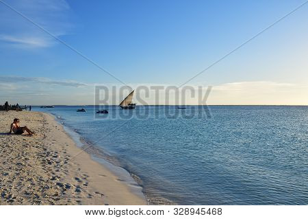 Kendwa, Tanzania - October 2, 2019: Kendwa Resort, Ocean And Relaxing Tourists Shown On The Beach At