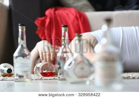 Portrait Of Male Napping After Rough Night Party. Male Drunkard Sleeping On Comfortable Sofa And Hol