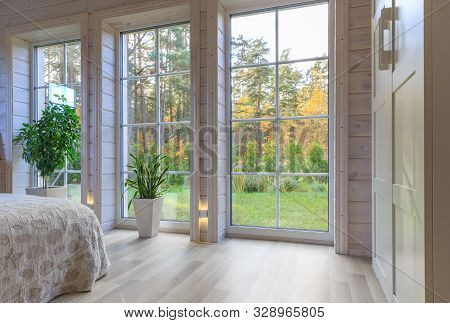 Bright Photo Studio Interior With Big Window, High Ceiling, White Wooden Floor