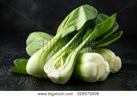 Pak Choi Chinese Cabbage On Rustic Black Background
