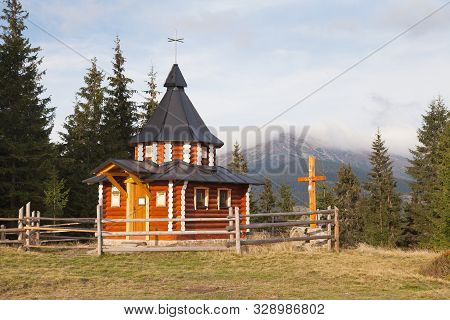 Small Wooden Church Or Chapel In Ukraine Carpathian Mountains