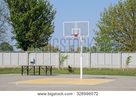 Basketball Court And Backboard With A Hoop. Yard Basketball.
