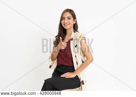 Proud Asian Patient Getting Vaccinated Against Coronavirus