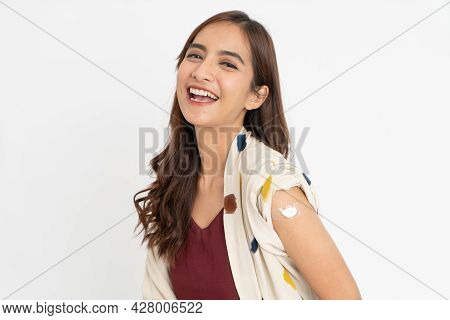 Asian Patient Getting Vaccinated Against Coronavirus By Doctor