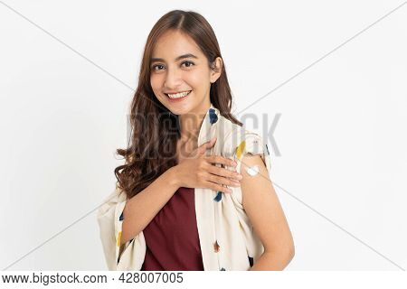 Asian Patient Getting Vaccinated Against Coronavirus By Doctor