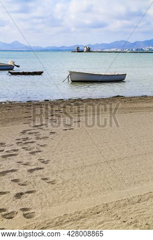 Boats Moored On La Concha Beach In Los Alcazares Village, (murcia Community, Spain) On A Sunny Day O