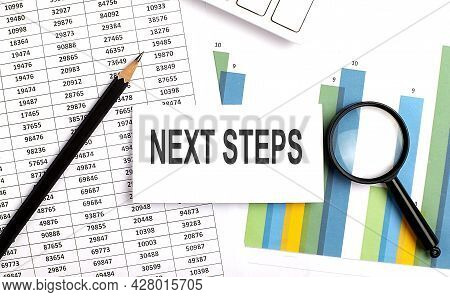 Next Steps Text On White Card On Chart Background