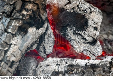 Smoldering Embers Of Burning Wood, Closeup In Details