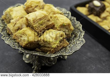 Tasty Sweet Baklava. Turkish Ramadan Dessert Baklava On A Decorative Plate. Baklava With Nuts And Ho