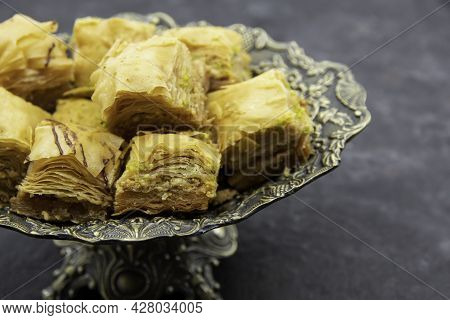 Tasty Sweet Baklava. Turkish Ramadan Dessert Baklava On A Decorative Plate. Baklava With Nuts And Ho