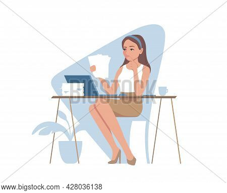 Young Businesswoman Doing Paperwork At The Table With A Laptop. A Thoughtful Young Woman Reading Doc