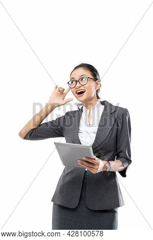 Young Pretty Business Woman Holding Tablet Getting An Idea