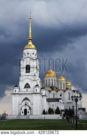 Russia, Vladimir, June 2021: Bell Tower Of The Assumption Cathedral In Vladimir In Cloudy Weather.