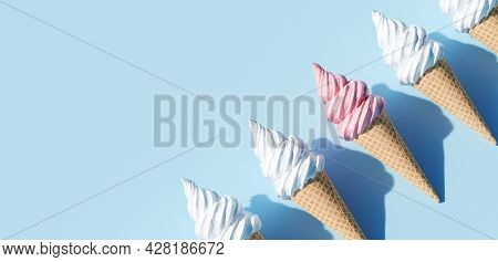 Soft serve ice cream in a cone on blue background. 3D illustration