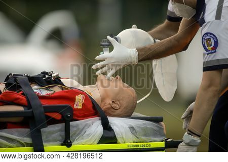 Bucharest, Romania - July 28, 2021: Paramedics Perform Cpr To A Plastic Dummy During A Public Demons