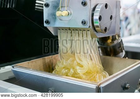 Waste Plastic Recycling Machine: Process Of Melting Polyethylene At Plant, Factory - Close Up View. 