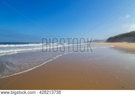 Beautiful empty beach near Sao Martinho do Porto, Portugal