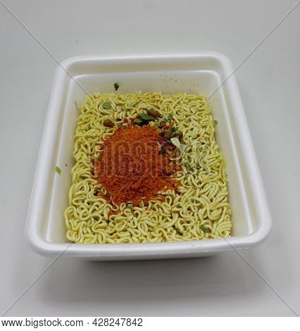 Instant Chinese Noodles With Hot Spices In A Disposable Bowl