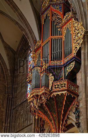 Strasbourg, France, June 23, 2021 : Strasbourg Cathedral Grand Organ. Located High On The Wall Of Th