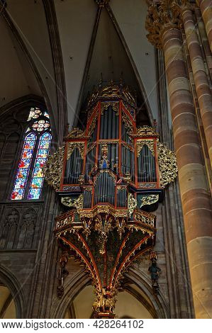 Strasbourg, France, June 23, 2021 : Strasbourg Cathedral Grand Organ. Located High On The Wall Of Th