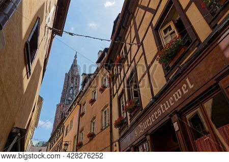 Strasbourg, France, June 23, 2021 : House With Half-timbered Wall, Renaissance Windows With Brackets
