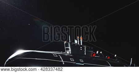 nuclear borei-class submarine model at night