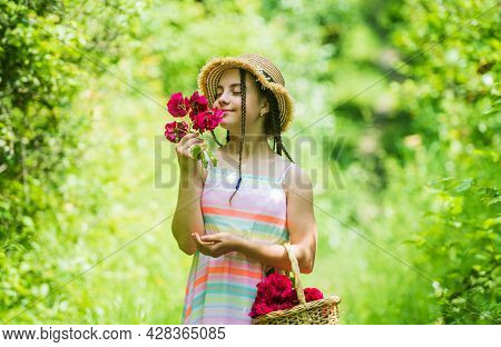 Nice Smell. Spring Kid Fashion. Girl With Rose Flowers. Green Nature. Gather Flower Bouquet